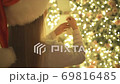 The little girl decorating a christmas tree. slow motion 69816485