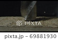 Drill Drilling Into A Wood Part. 69881930