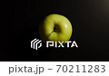 TOP VIEW: Green apple on a black surface - Stop motion 70211283