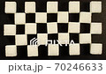 TIME-LAPSE: Sugar cube melting on a black surface - Top view 70246633
