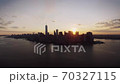 Warm orange evening sunset sky over New York famous popular skyline cityscape in incredible drone 70327115