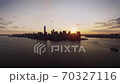 Warm orange evening sunset sky over New York urban famous skyline cityscape in magnificent drone 70327116
