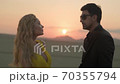 Romantic couple in love at sunset,love in the sun.Cuddling couple 70355794