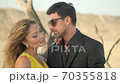 Romantic couple love .Cuddling couple,Romantic young couple embracing in desert 70355818