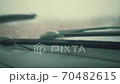 Front car windshield with rain drops on it while driving. Focusing rain drops. Driving in the rain 70482615