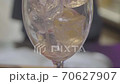 Inside of a restaurant bar, close up slow mo shot of making a cocktail 70627907