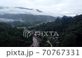 A view of the rice fields in the morning And a small village 70767331