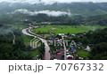 A view of the rice fields in the morning And a small village 70767332