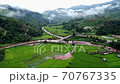 A view of the rice fields in the morning And a small village 70767335