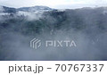 A view of the rice fields in the morning And a small village 70767337