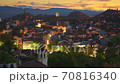 Evening view of Plovdiv old town, Bulgaria. Old illuminated houses and sunset sky. Zoom out shot. View from Nebet Tepe hill Plovdiv city canter. 4K 70816340