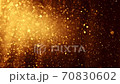 Gold floating dust particles on dark background. Magic dust particles with elegant bokeh circles. New year and Christmas fairy background. 4K 70830602