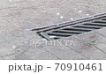 Raining heavily in the street 70910461
