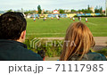 Man and Woman Watching Football 71117985