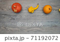Moving vegetables on kitchen table, harvest background - stop motion animation. 71192072