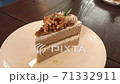 Slow motion footage of cake in cafe. 71332911