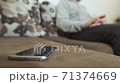 The man takes the phone to which the message comes. 71374669