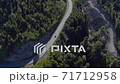 Aerial of a truck driving down, Llancahue, Hornopiren at Austral, Route 7, Chile, South America. 71712958