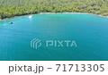 Pure nature with incredible clear green waters on a summer day in Didim, Turkey 71713305