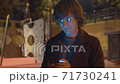 Hipster typing in smartphone 71730241