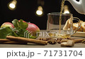Tea pouring into glass mug 71731704