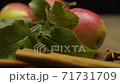 Apples with leaves and spices 71731709