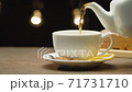 Cup of tea with lemon and sugar 71731710