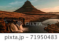 Sunrise in Kirkjufell mountain and Kirkjufellsfoss waterfall in Grundarfjordur, Iceland 71950483