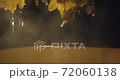 Close up view of oak broom in wooden tub in bath with hot steam from water on black background in slowmotion 72060138