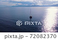 Romantic view of beautiful boat on the sea and majestic mountains in sunlight. 72082370
