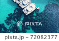 Top down view of small boats on crystal clear translucent blue water. 72082377