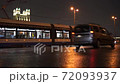 Moscow, Russia - November 19, 2020: Stalinist skyscraper on Kotelnicheskaya embankment, Big traffic over Bolshoy (Big) Ustinsky Bridge during coronavirus pandemic. 72093937