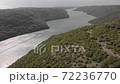Aerial of shining waters of Lim bay. Green coastal forest of Istra, Croatia 72236770