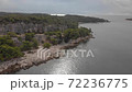 Former quarry in rocks at the sea shore. Park forest Zlatni Rt at Rovinj, Croatia. Aerial shot 72236775
