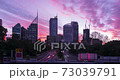 Timelapse of a cloudy and colourful sunset over Sydney traffic, Australia 73039791