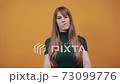 Human hand thumb down, no okay, angry face, negative gesture showing dislike 73099776