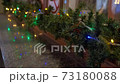 Fabulous Christmas decorations on the streets of the city, they are decorated with luminescent garlands. 73180088