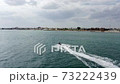 young tourists ride on the sea on a jet ski 73222439