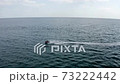 two jet skis ride on the sea 73222442