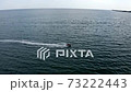 jet ski at high speed cuts the water surface 73222443