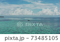 4K aerial drone footage of boat in the blue ocean 73485105