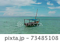 4K aerial drone footage of boat in the blue ocean 73485108