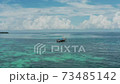 4K aerial drone footage of boat in the blue ocean 73485142