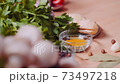 Fragrant herbs and spices on the table 73497218
