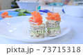 Cooking canapes in the kitchen at home 73715318