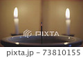 線香とろうそくの炎の4Kタイムラプス 73810155
