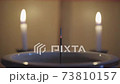 線香とろうそくの炎の4Kタイムラプス 73810157