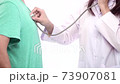 Close up of young woman doctor ware uniform lab coat use stethoscope to listen heart 73907081