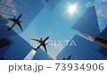 Animation of airplane flying in city above buildings and skyscrapers. 73934906