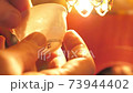 A thin porcelain cup is translucent. Tea ceremony. Handwork 73944402